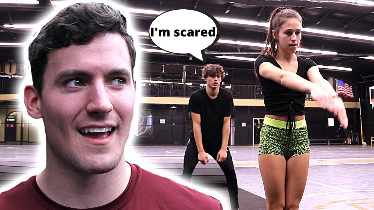 Did he just scream like a girl!? (scariest cheer stunt)