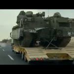 Israel troops and heavy armor move toward Gaza