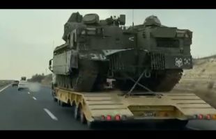 Israel troops and heavy armor move toward Gaza