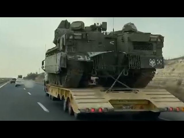 Israel troops and heavy armor move toward Gaza