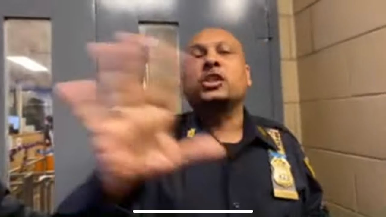 Midtown North Precinct-NYPD no recording signs must be removed by court order